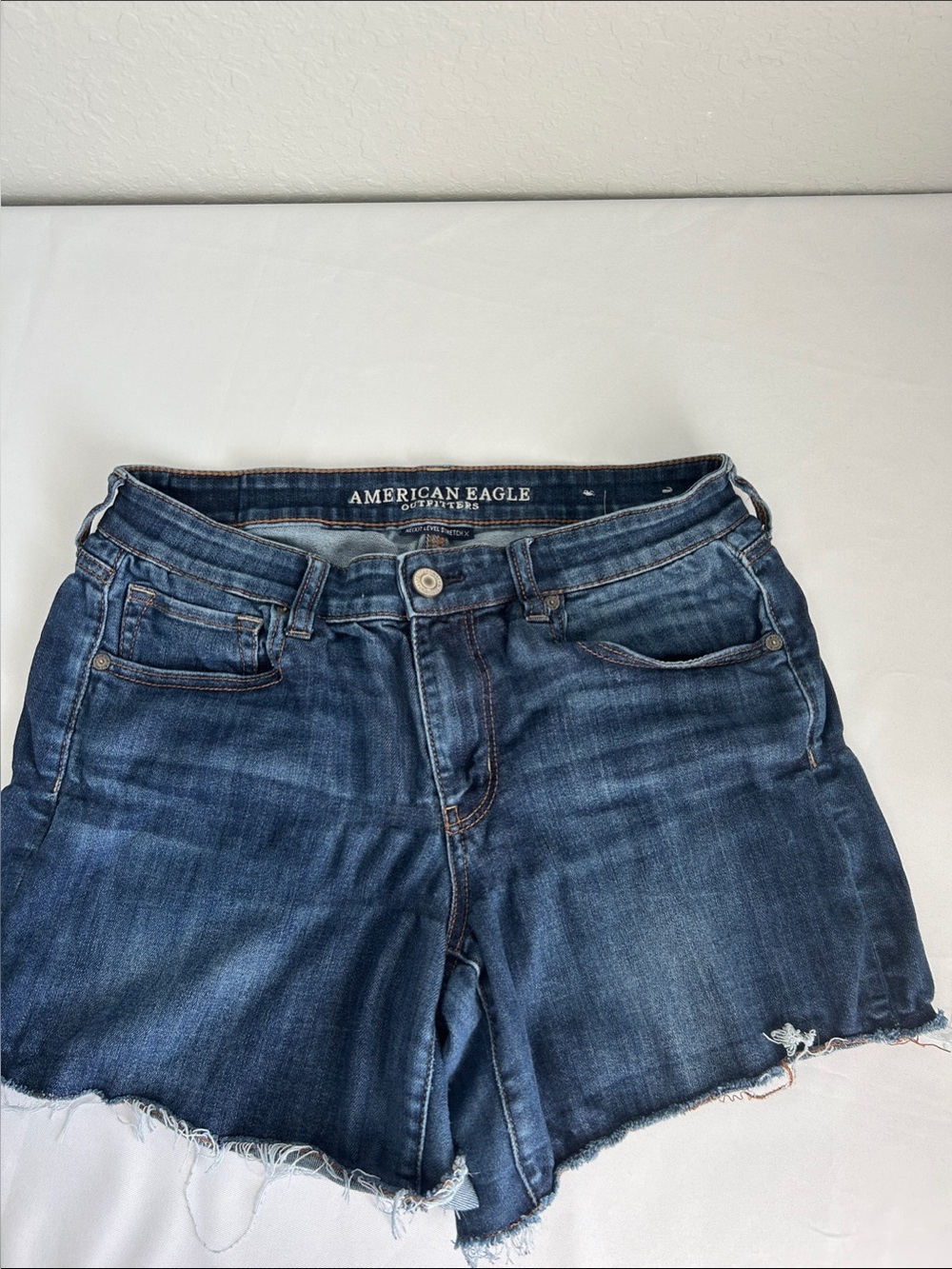American Eagle Cutoff Denim Shorts Women Blue Raw Hem Next Level Stretch